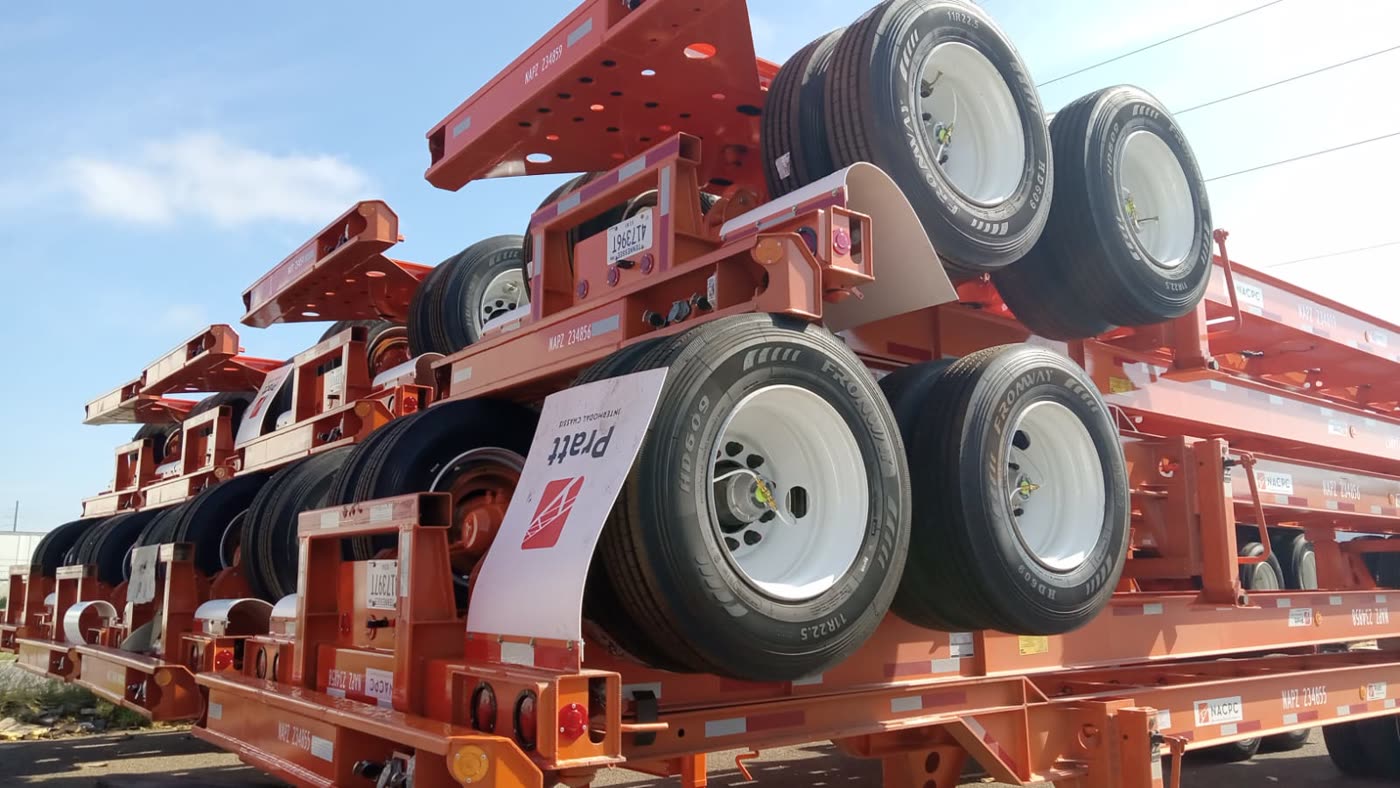 New container chassis stacked in a yard before import