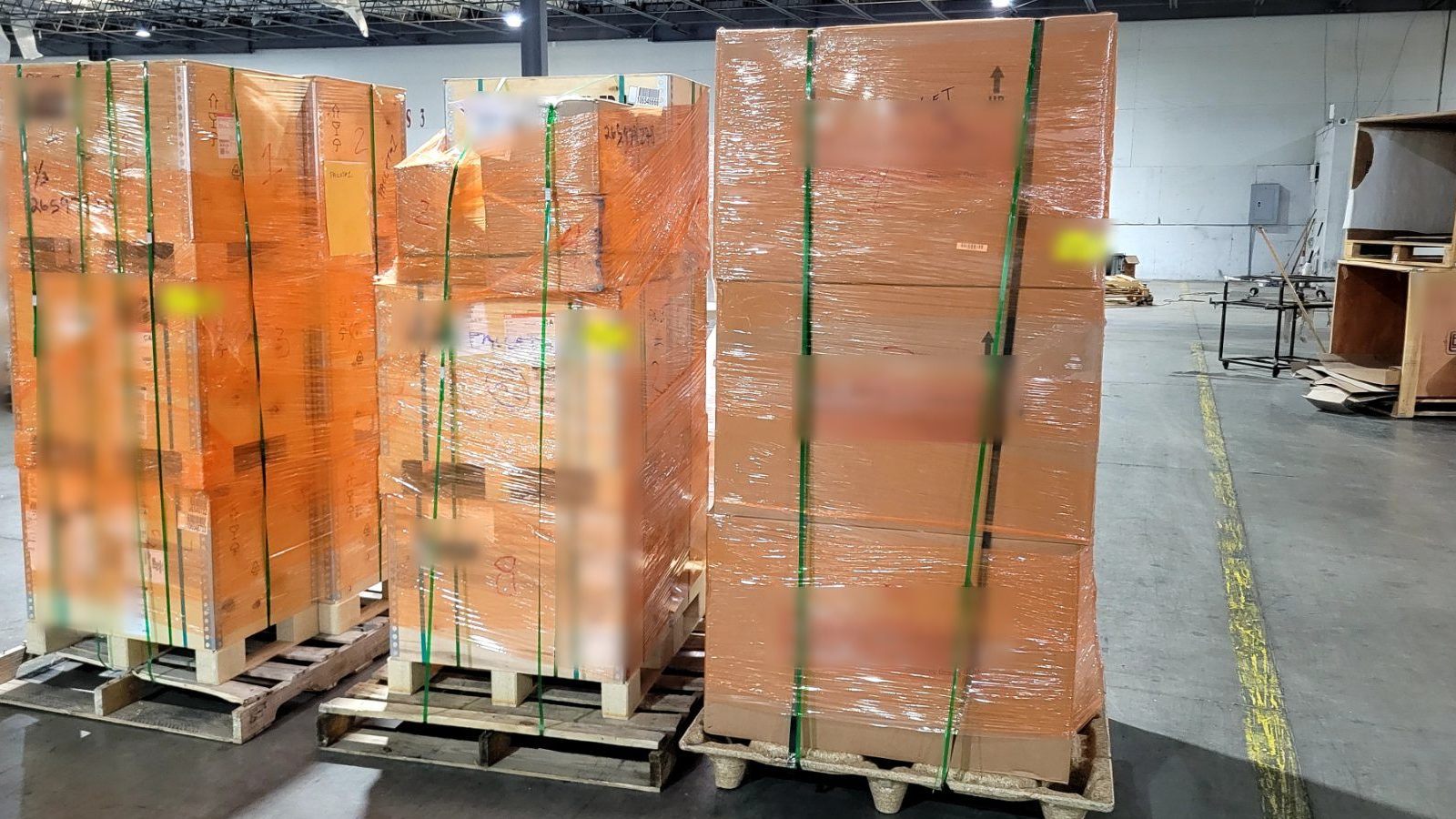 Consolidated pallets wrapped and strapped inside the Fast Distribution warehouse