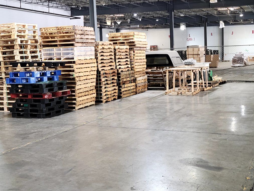 Stacks of pallets inside the Fast Distribution warehouse in Laredo